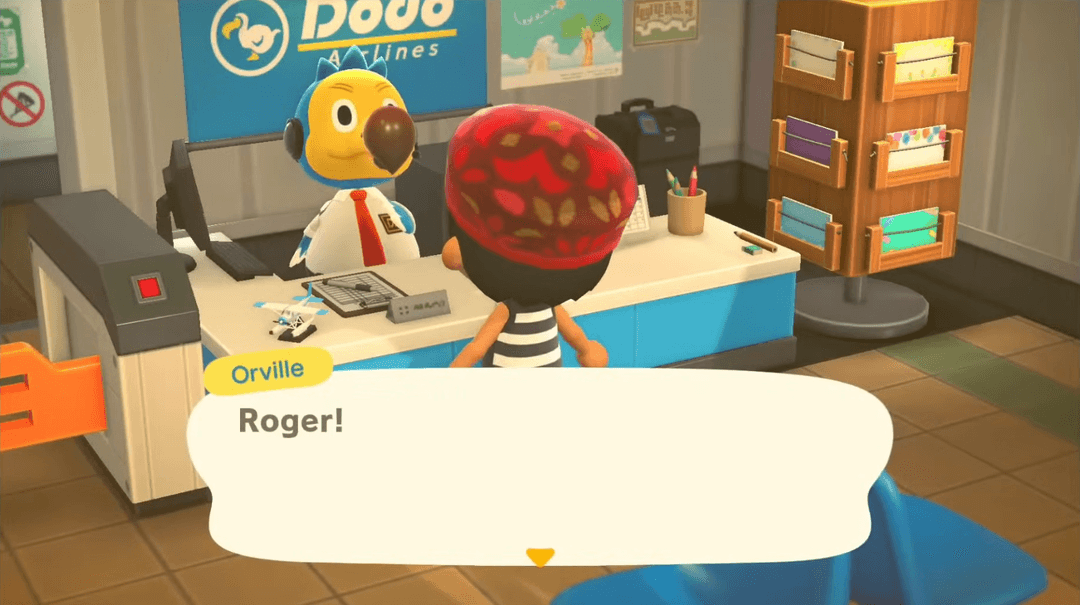 Orville the Dodo working behind the counter at Dodo Airlines.