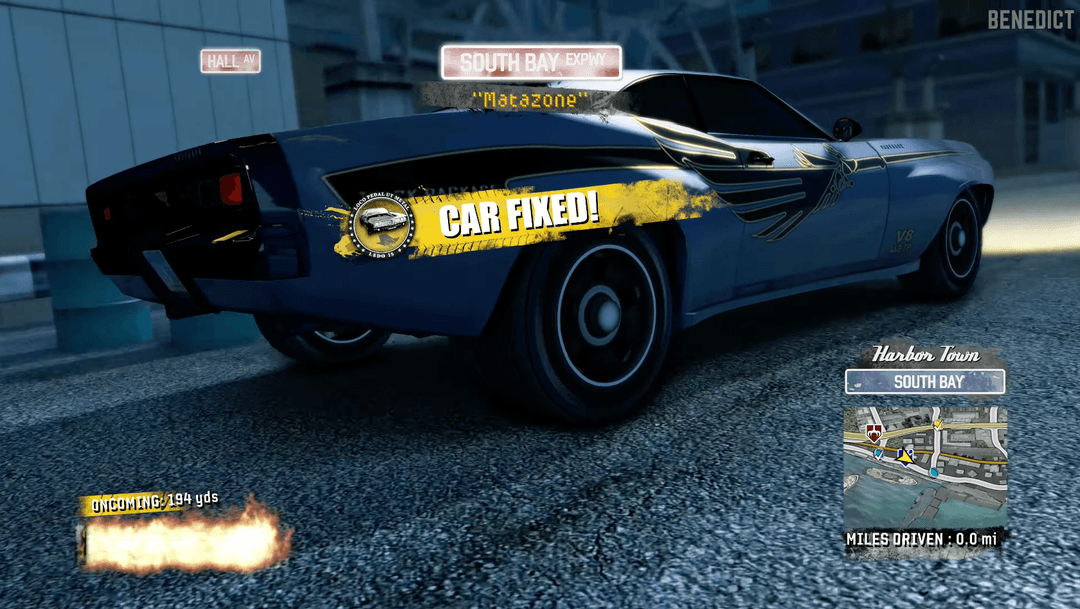 Car driving through a repair shop in Burnout Paradise.