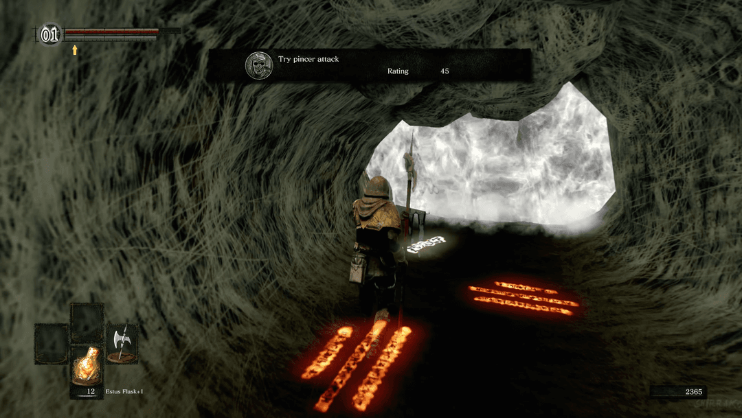 An Orange Guidance Soapstone message on the ground in Dark Souls.