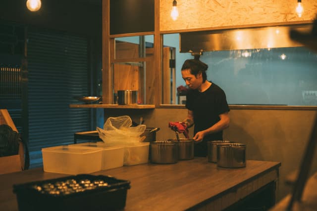 A lone chef preparing for the day ahead